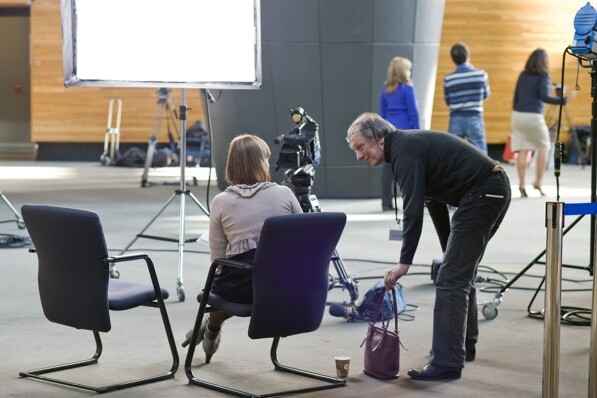 A man and woman in a Brussels studio